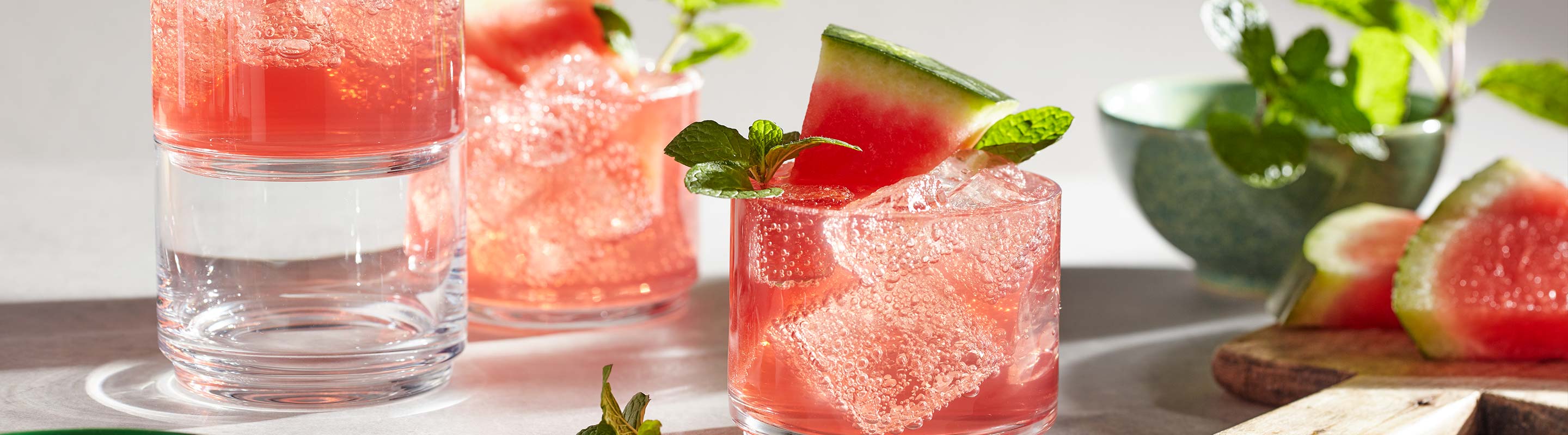 Clear Tuscany Classics Stackable Glasses with Watermelon Cocktail