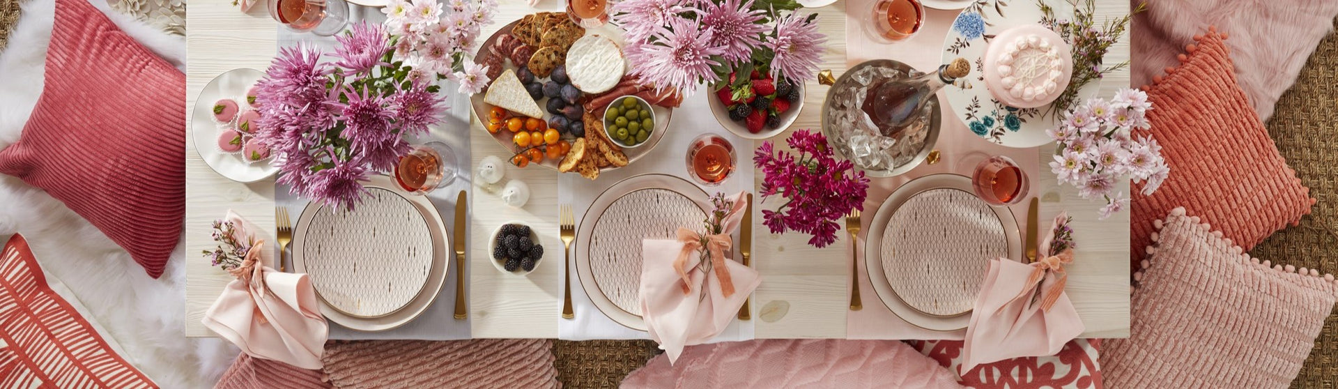 overhead of table with pink and floral accents