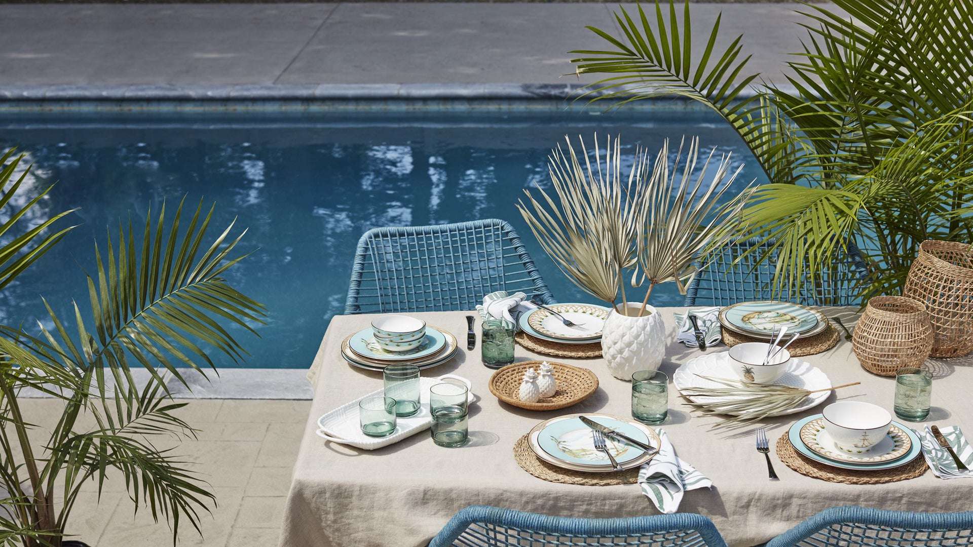 Tropical table setting by a poolside