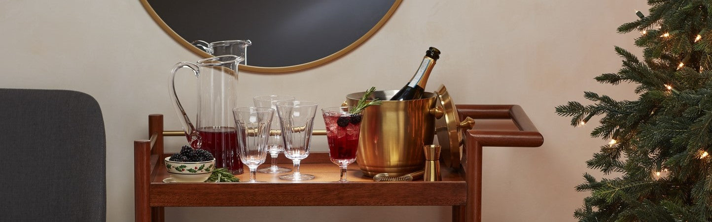 bar cart with glassware and barware