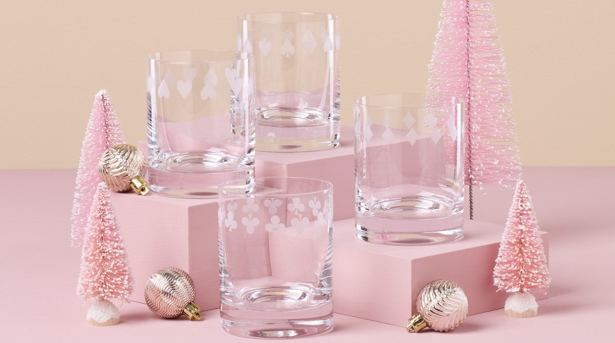 Festive glassware with card suit patterns