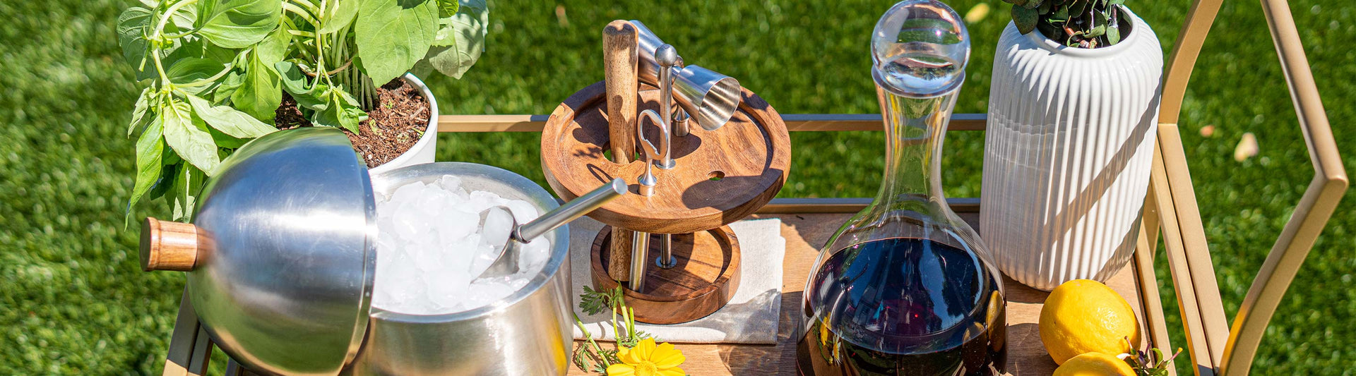 Barcart with ice bucket, carafe, and bar tools