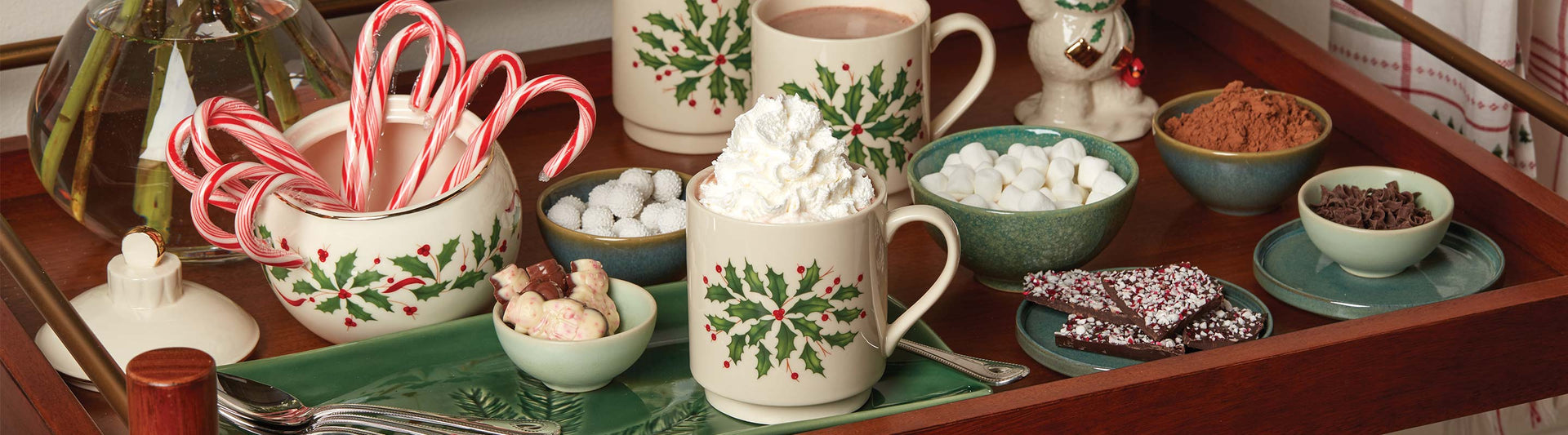 Hot cocoa bar featuring Lenox Holiday mugs and serveware