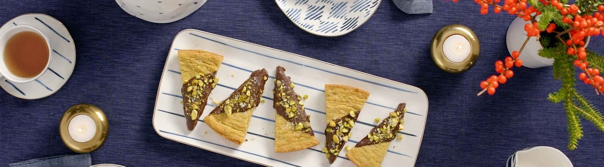Chocolate dipped pistachio shortbread served on a Lenox Blue Bay Tray