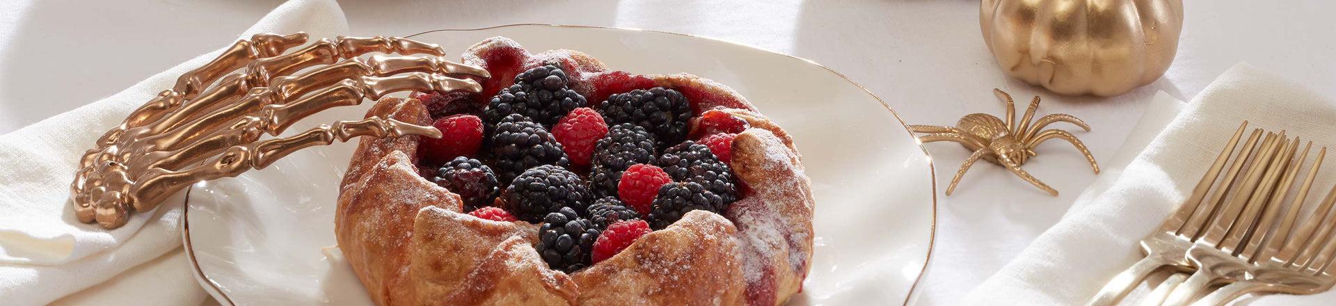 Blue Bay White Dishes with a dessert tart and Halloween elements