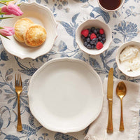 Tablescape with French Perle Bead dinnerware and gold flatware.