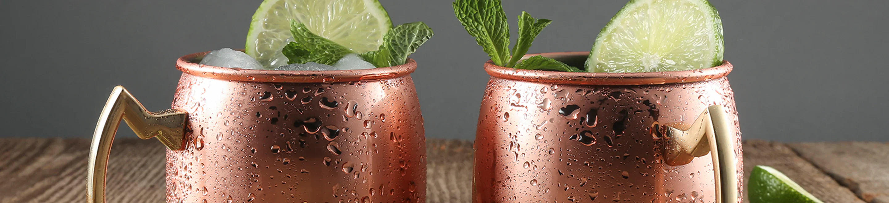 copper moscow mule mugs with limes and mint
