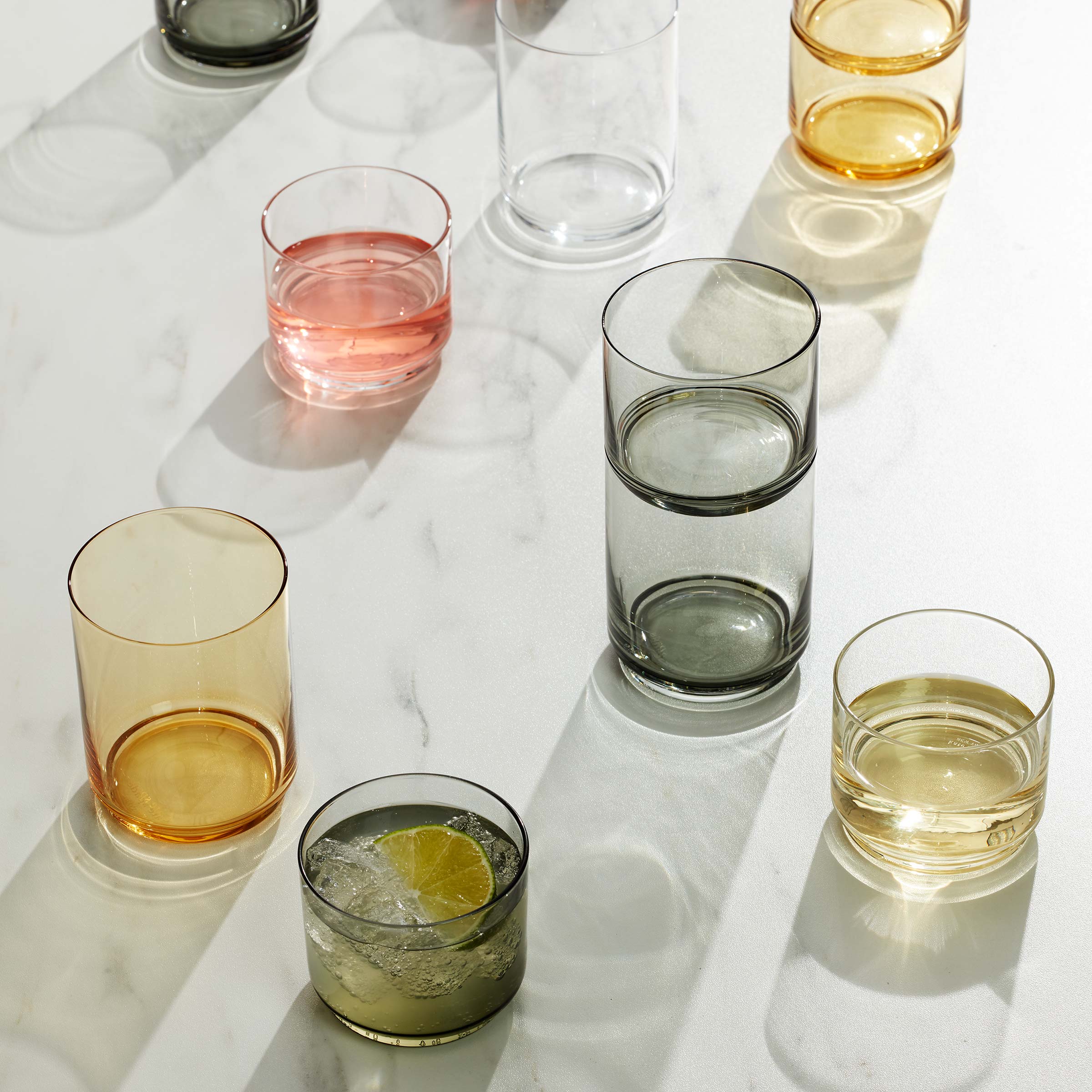 All-purpose glassware in different glass colored finishing.