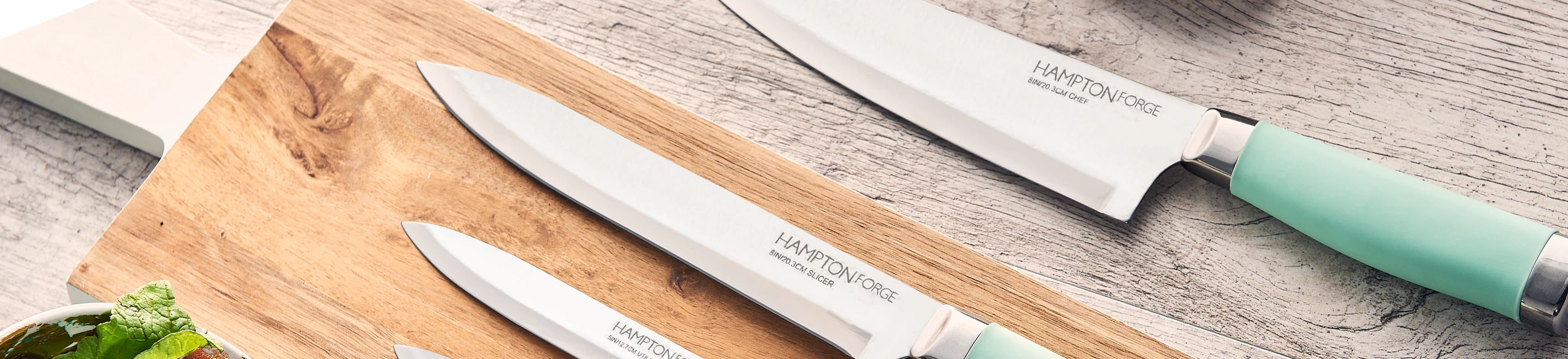 overhead shot of cutlery on a marble counter