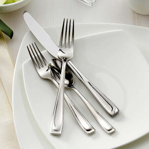 Moda flatware set on a white square plate