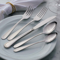 Flight flatware on a gray plate